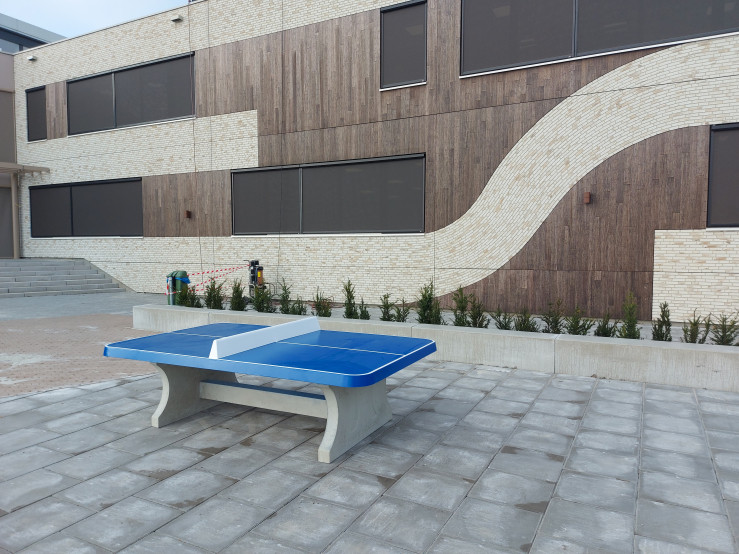 Blue table tennis table,  rounded