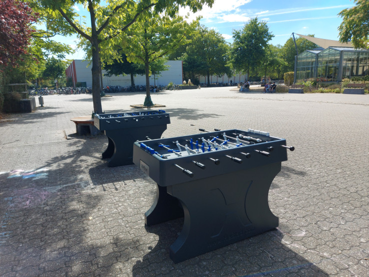 Two Football tables in the schoolyard
