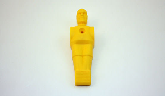Football figure yellow plastic